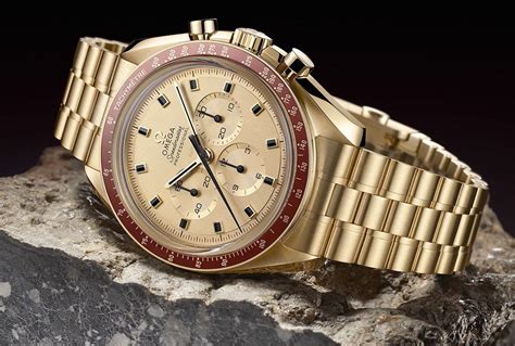 omega speedmaster 50th anniversary gold.